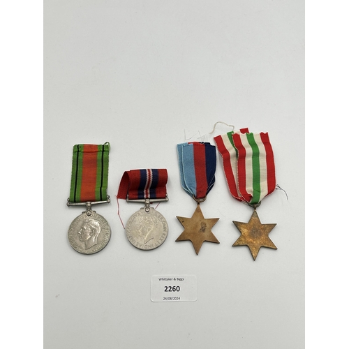 2260 - Four WWII medals, War, The Defence, The Italy Star and the 1939-1945 Star