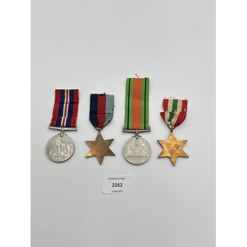 2262 - Four WWII medals, War, The Defence, The Italy Star and the 1939-1945 Star