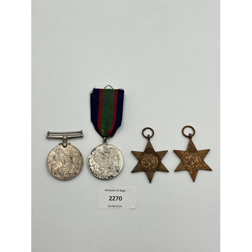 2270 - Four WWII medals, The 1939-1945 Star, War, The Burma Star and Canadian Volunteer Service