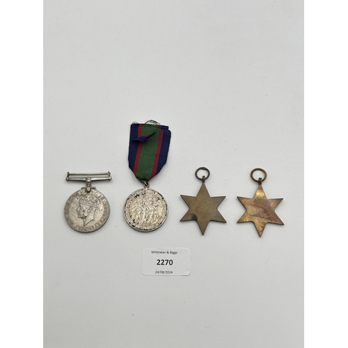 2270 - Four WWII medals, The 1939-1945 Star, War, The Burma Star and Canadian Volunteer Service