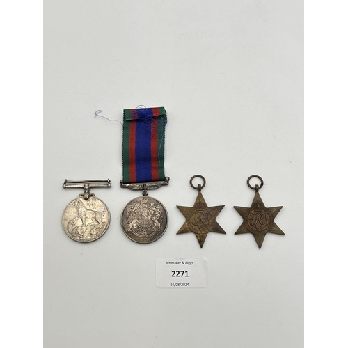 2271 - Four WWII medals, The 1939-1945 Star, War, The Burma Star and Canadian Volunteer Service