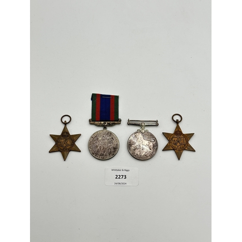 2273 - Four WWII medals, The 1939-1945 Star, War, The Burma Star and Canadian Volunteer Service