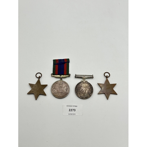 2273 - Four WWII medals, The 1939-1945 Star, War, The Burma Star and Canadian Volunteer Service