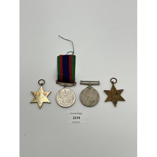 2274 - Four WWII medals, The 1939-1945 Star, War, The Burma Star and Canadian Volunteer Service