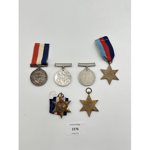 2276 - Six WWII medals, The Burma Star, The 1939-1945 Star, The Defence, The France and Germany Star, War a... 