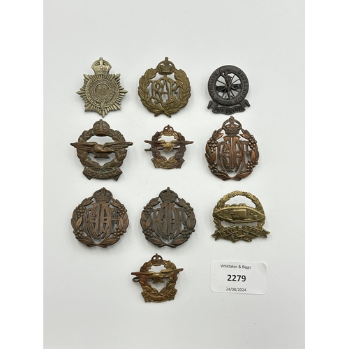 2279 - Ten military cap badges