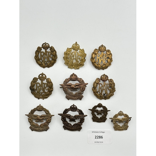 2286 - Ten military cap badges