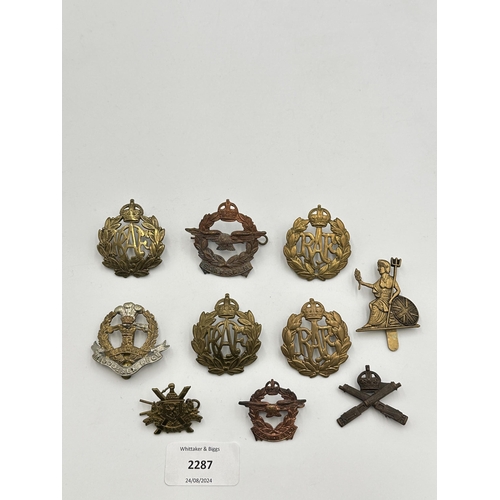 2287 - Ten military cap badges