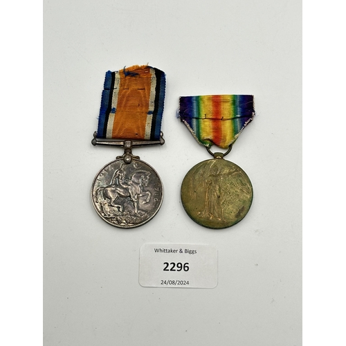 2296 - A WWI medal pair presented to Pte. W. M. Mould 9th S.A.H. comprising War and Bilingual Victory