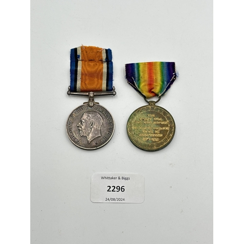 2296 - A WWI medal pair presented to Pte. W. M. Mould 9th S.A.H. comprising War and Bilingual Victory