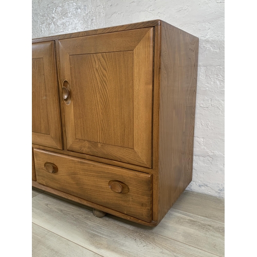 1 - An Ercol Windsor Model 468 blonde elm sideboard - approx. 77cm high x 129cm wide x 43cm deep