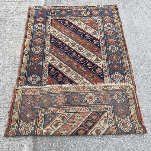 101 - A late 19th century Caucasian Genje rug - approx. 230cm x 125cm