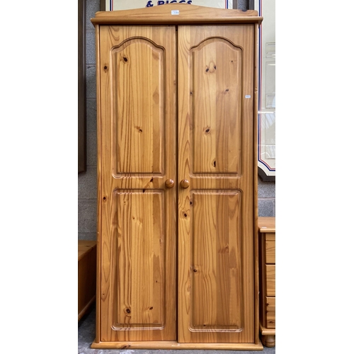 11 - Three pieces of pine bedroom furniture, double wardrobe approx. 173cm high x 86cm wide x 50cm deep, ... 