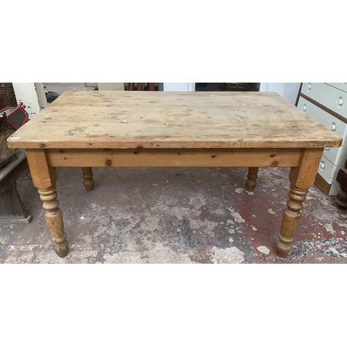 122 - A Victorian style pine farmhouse dining table - approx. 80cm high x 90cm wide x 152cm long