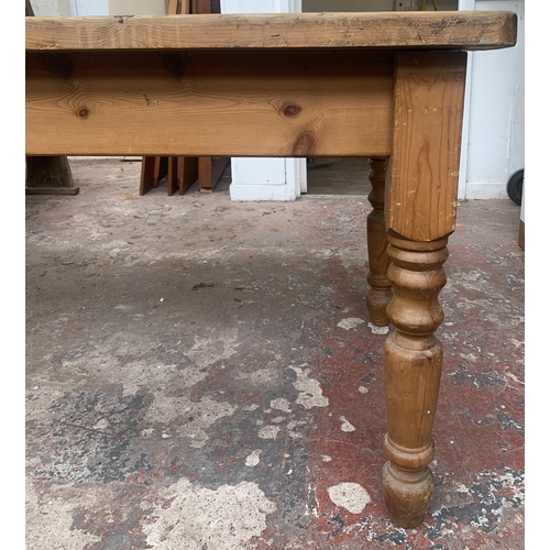 122 - A Victorian style pine farmhouse dining table - approx. 80cm high x 90cm wide x 152cm long