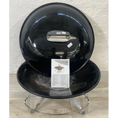 128 - A Weber outdoor wood burning fireplace - approx. 63cm diameter