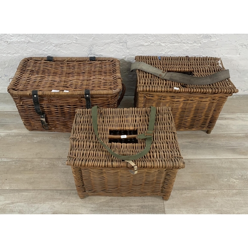 129 - Three wicker baskets, two vintage fishing and one twin handled