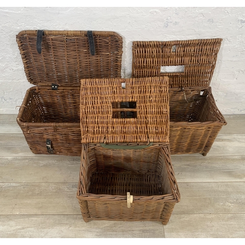 129 - Three wicker baskets, two vintage fishing and one twin handled