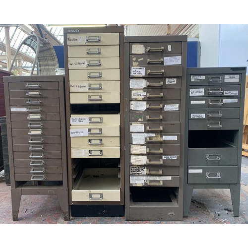 132 - Four metal filing cabinets - largest approx. 95cm high x 28cm wide x 41cm deep