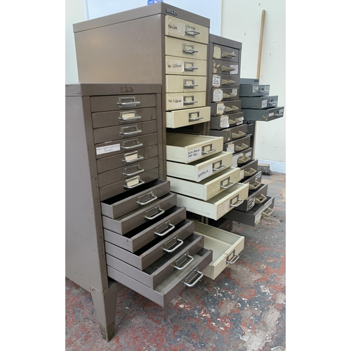 132 - Four metal filing cabinets - largest approx. 95cm high x 28cm wide x 41cm deep