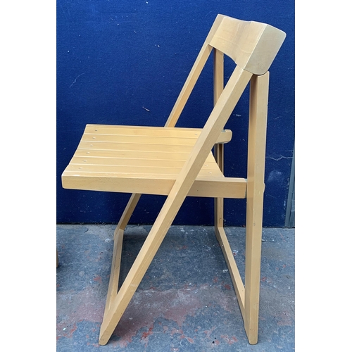 134 - Four beech folding chairs