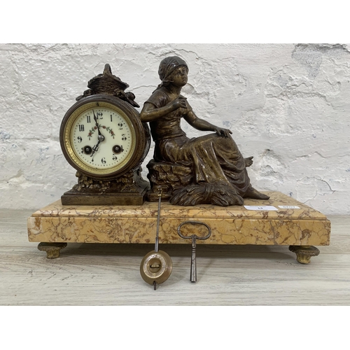 14 - A French bronzed spelter figural mantel clock on marble plinth with pendulum and key - approx. 26cm ... 