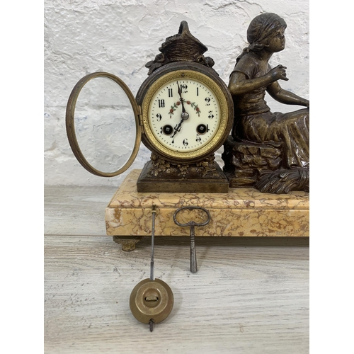 14 - A French bronzed spelter figural mantel clock on marble plinth with pendulum and key - approx. 26cm ... 