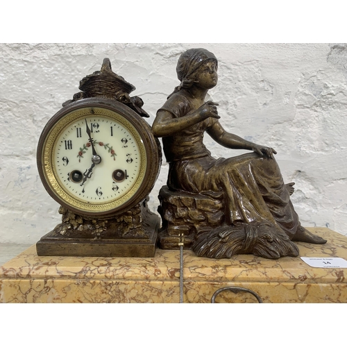 14 - A French bronzed spelter figural mantel clock on marble plinth with pendulum and key - approx. 26cm ... 