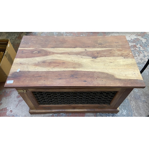 62 - An Indian sheesham wood TV stand - approx. 60cm high x 90cm wide x 50cm deep