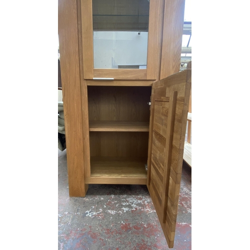 170 - An Arighi Bianchi oak display cabinet - approx. 190cm high x 70cm wide x 39cm deep