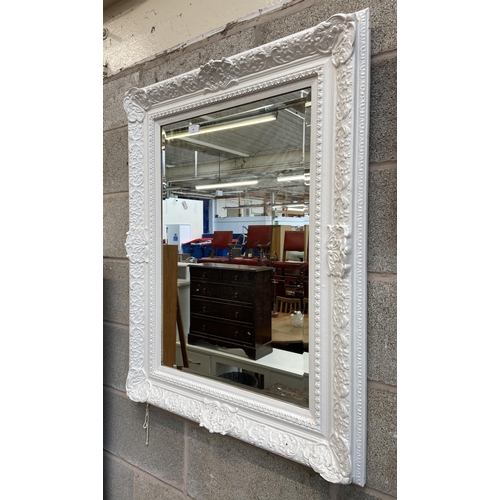 18 - A French style white painted framed bevelled edge wall mirror - approx. 100cm high x 74cm wide