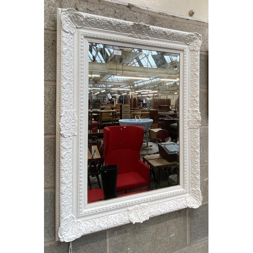 18 - A French style white painted framed bevelled edge wall mirror - approx. 100cm high x 74cm wide