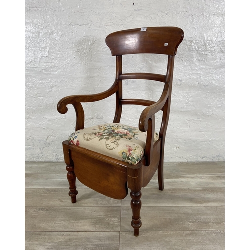 68 - A 19th century stained beech commode armchair