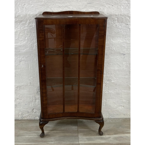 70 - A walnut display cabinet on cabriole supports - approx. 115cm high x 58cm wide x 28cm deep