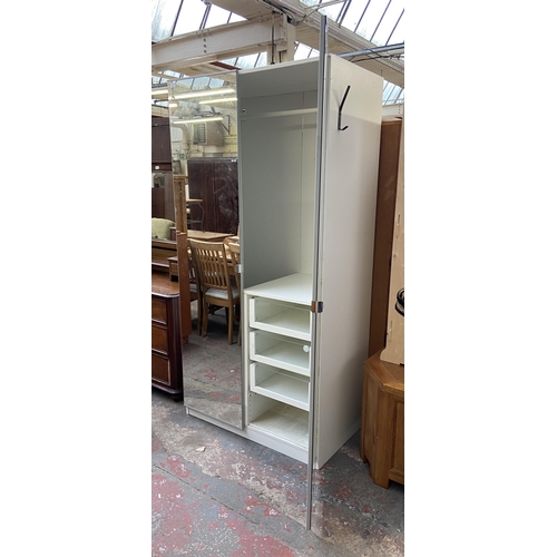 202 - An IKEA white laminate and mirror glass double wardrobe - approx. 201cm high x 100cm wide x 60cm dee... 