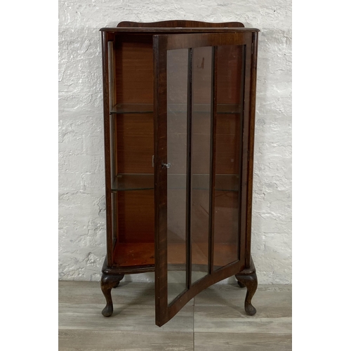 70 - A walnut display cabinet on cabriole supports - approx. 115cm high x 58cm wide x 28cm deep