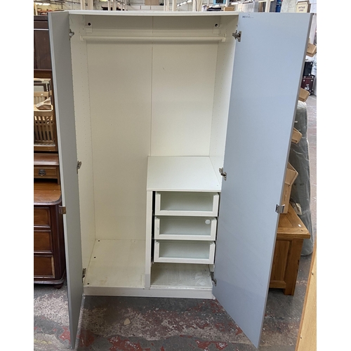 202 - An IKEA white laminate and mirror glass double wardrobe - approx. 201cm high x 100cm wide x 60cm dee... 