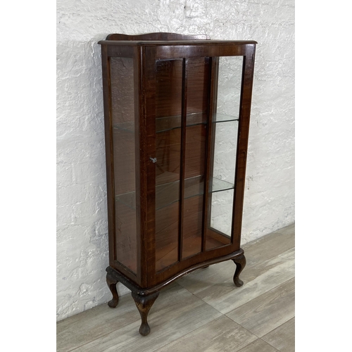 70 - A walnut display cabinet on cabriole supports - approx. 115cm high x 58cm wide x 28cm deep