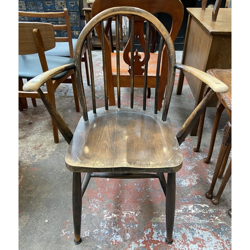 72 - Two pieces of furniture, one Ercol elm and beech carver chair and one Queen Anne style burr walnut n... 