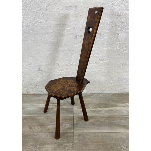 76 - An Arts & Crafts pokerwork spinning chair - approx. 98cm high x 30cm wide x 47cm deep