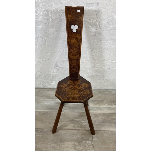 76 - An Arts & Crafts pokerwork spinning chair - approx. 98cm high x 30cm wide x 47cm deep