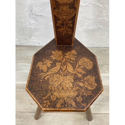 76 - An Arts & Crafts pokerwork spinning chair - approx. 98cm high x 30cm wide x 47cm deep