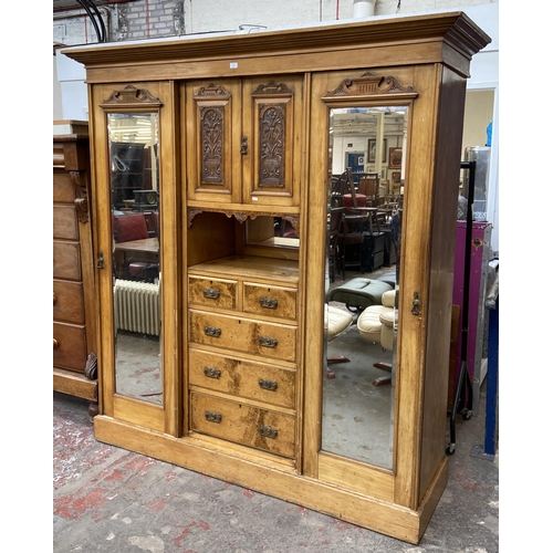 85 - A Victorian ash and carved walnut compactum wardrobe - approx. 206cm high x 193cm wide x 59cm deep