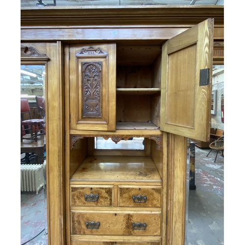 85 - A Victorian ash and carved walnut compactum wardrobe - approx. 206cm high x 193cm wide x 59cm deep