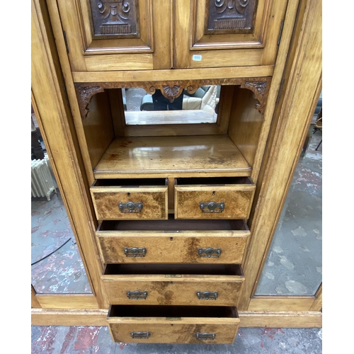 85 - A Victorian ash and carved walnut compactum wardrobe - approx. 206cm high x 193cm wide x 59cm deep