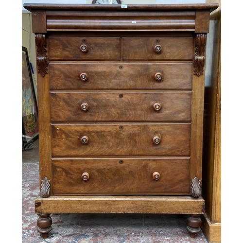 86 - A Victorian mahogany chest of drawers on turned supports with carved acanthus leaf design - approx. ... 