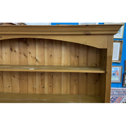 33 - A Victorian style pine four tier bookcase - approx. 147cm high x 137cm wide x 28cm deep