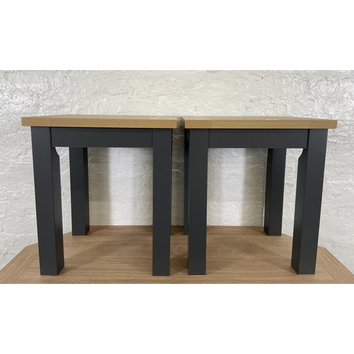 34 - Three pieces of Next Malvern slate grey and oak effect furniture, two side tables - approx. 49cm hig... 