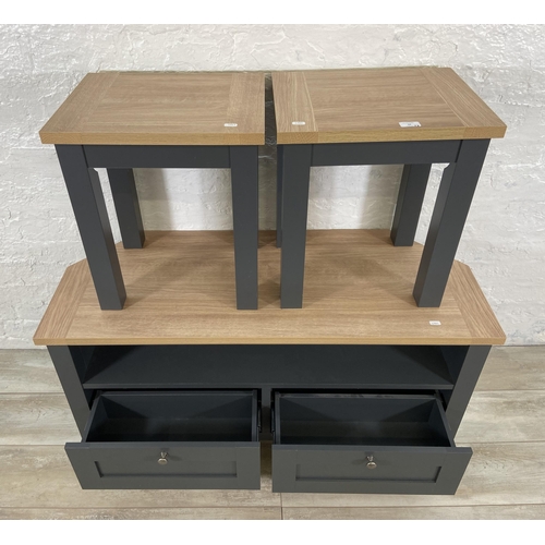 34 - Three pieces of Next Malvern slate grey and oak effect furniture, two side tables - approx. 49cm hig... 