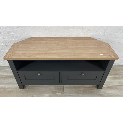 34 - Three pieces of Next Malvern slate grey and oak effect furniture, two side tables - approx. 49cm hig... 